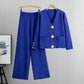 Women's two-piece set with buttoned sweater and wide-leg pants