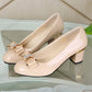 Shiny high heel shoes with bow for women