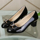 Shiny high heel shoes with bow for women
