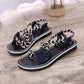Flat sandals with braided strap for women