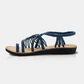 Flat sandals with braided strap for women