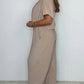 Solid color loose jumpsuit with V-neck